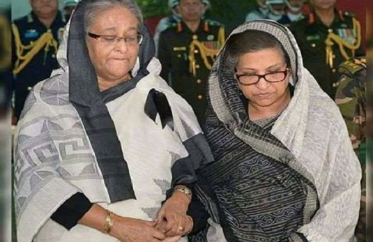 বাবার কবরের পাশে শোকে বিহ্বল দুই বোন