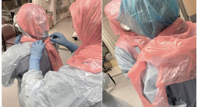 যুক্তরাজ্যে স্বাস্থ্যকর্মীরা চিকিৎসা সেবা দিচ্ছেন ময়লা ফেলার ব্যাগ মাথায় দিয়ে