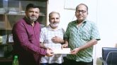 ফটো সাংবাদিক মামুন হাসানের পাশে তামাবিল পাথর আমদানিকারক গ্রুপ
